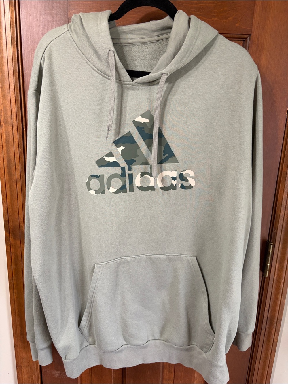 adidas Men’s Sage Green Hoodie with Camo Logo.